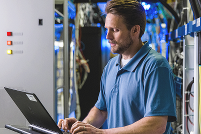 Person working in server room