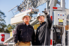 utility workers collaborating